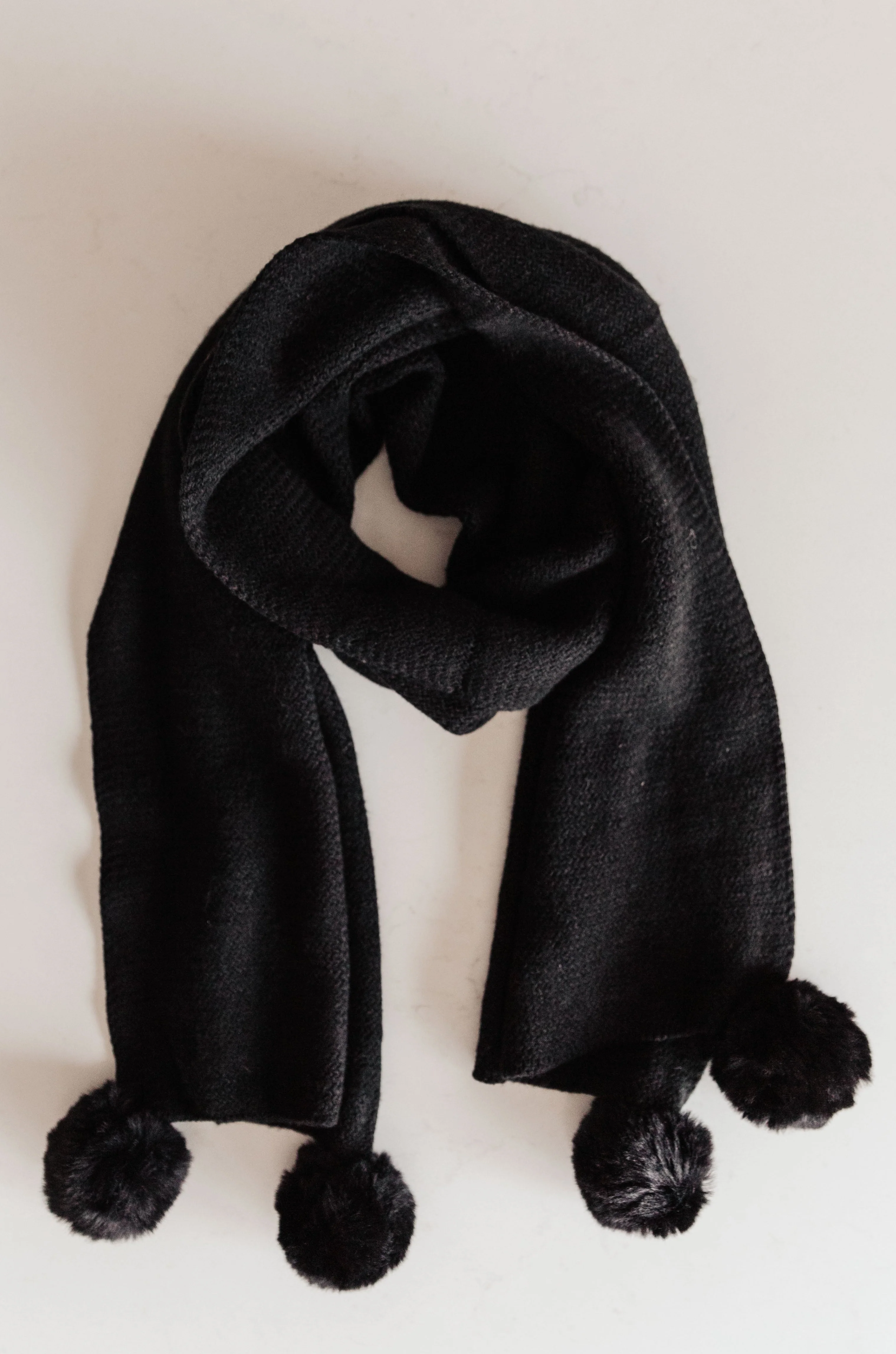 Knitted Fuzzy Pom Pom Scarf In Black - 1/11/2022 - Image 2