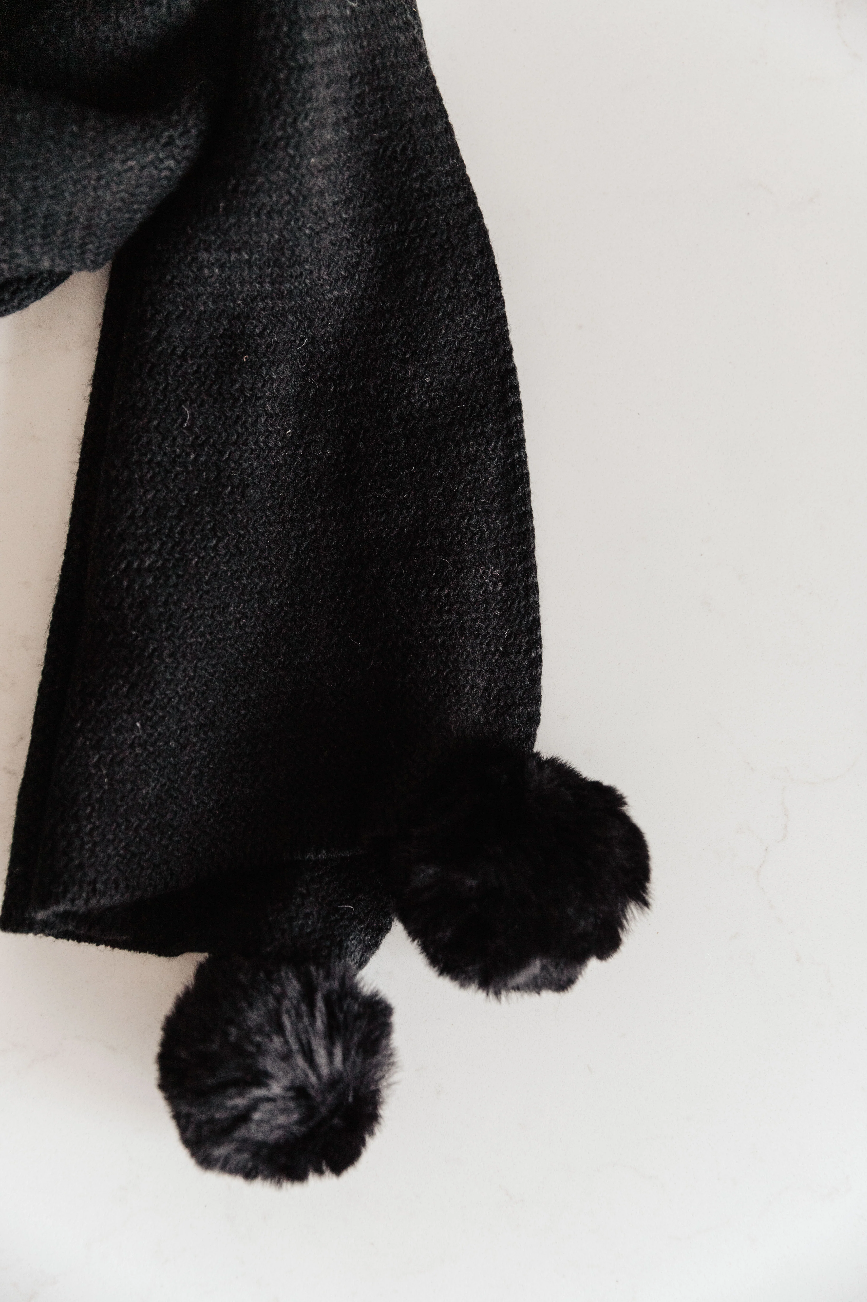 Knitted Fuzzy Pom Pom Scarf In Black - 1/11/2022 - Image 4